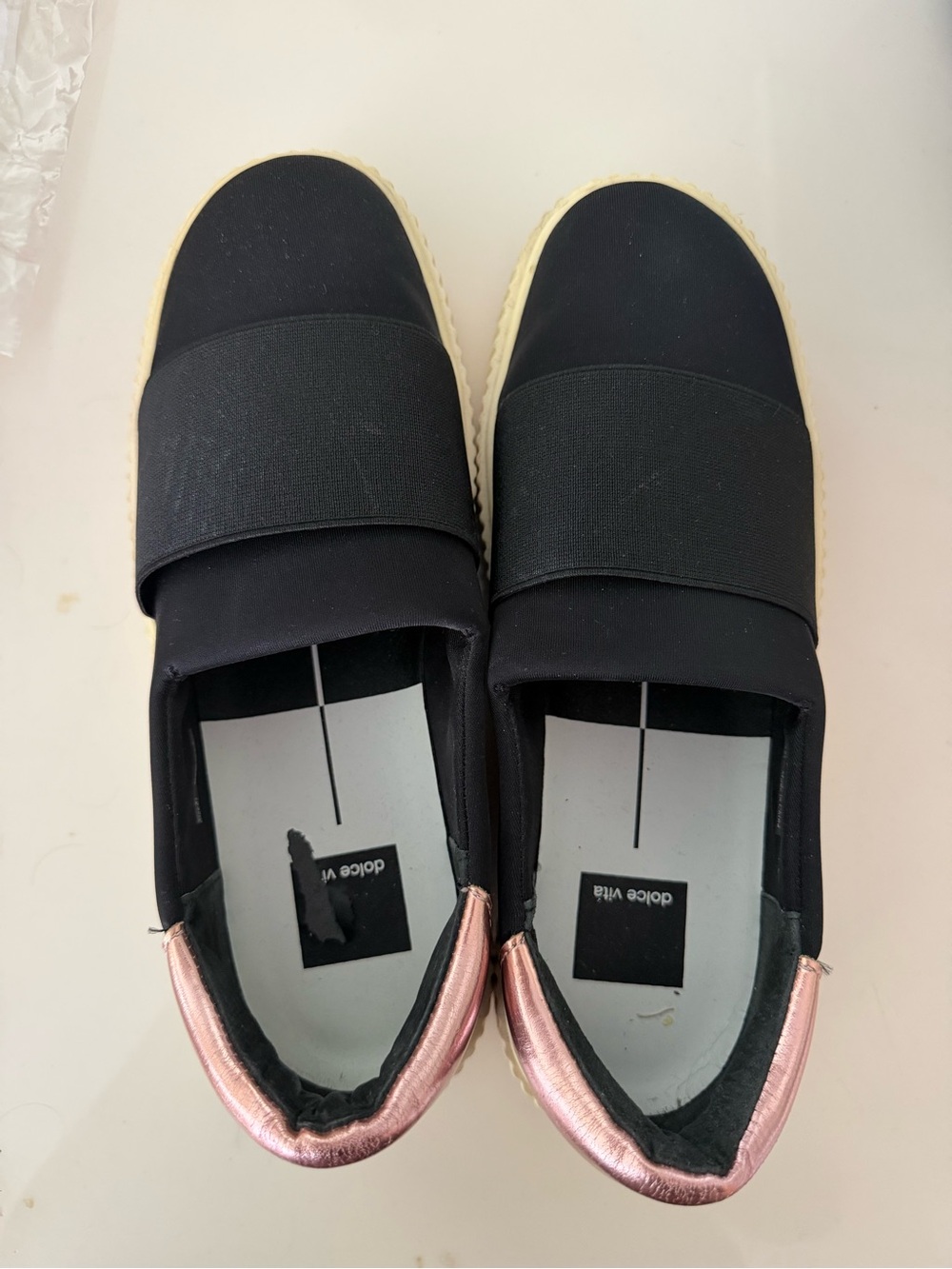 Dolce Vita Black Slip-On Sneakers with Rose Metallic Heel Tab